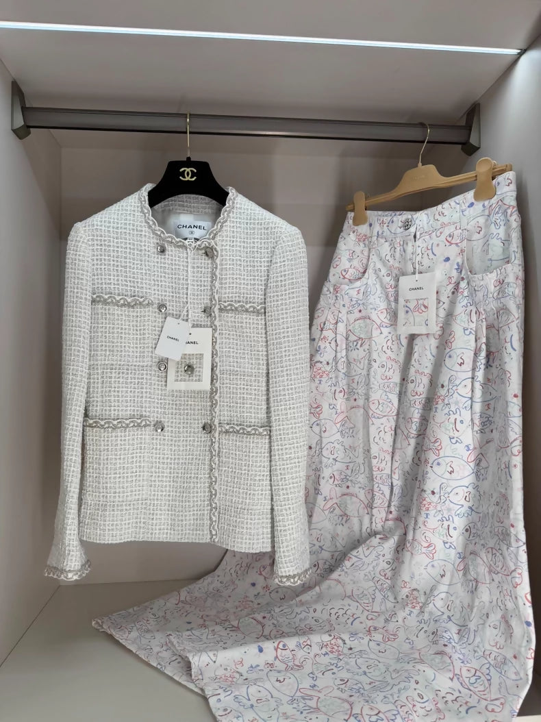 Chanel 25s white tweed jack yet