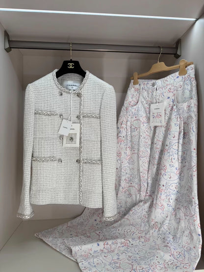Chanel 25s white tweed jack yet