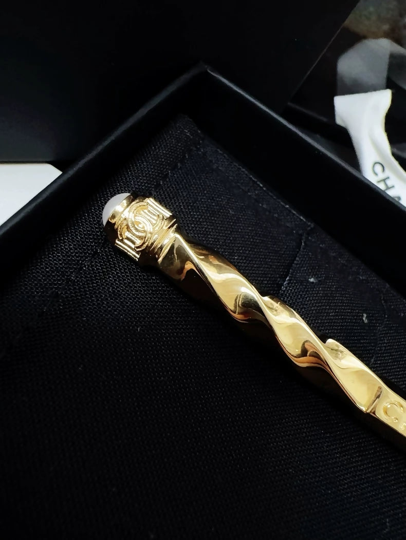 Chanel 25K gold spiral pearl button pencil brooch