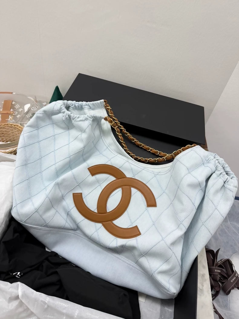 Chanel 26M Coco Beach light blue calfskin tote bag