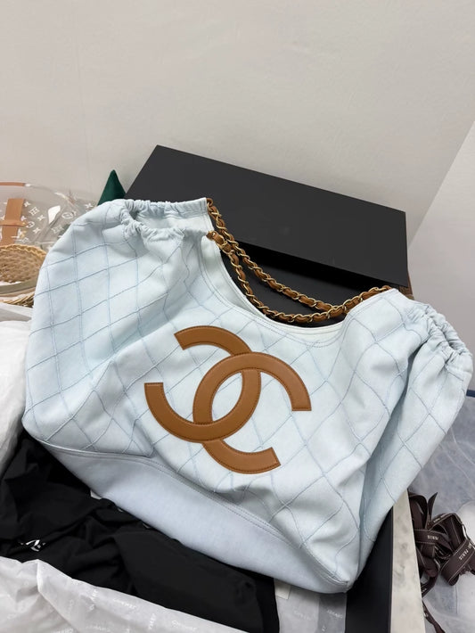 Chanel 26M Coco Beach light blue calfskin tote bag