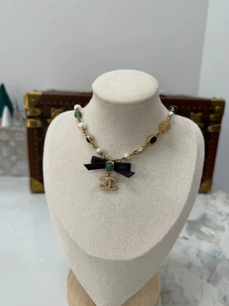 Chanel Pearl Leather Bow Necklace