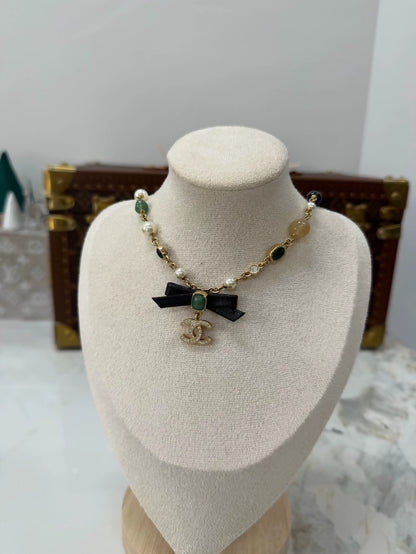 Chanel Pearl Leather Bow Necklace