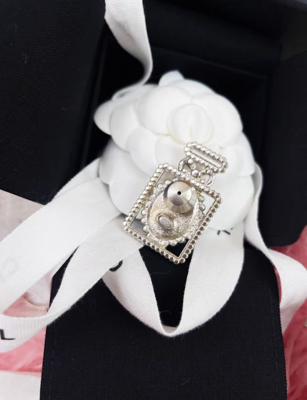 Chanel silver diamond perfume bottle brooch