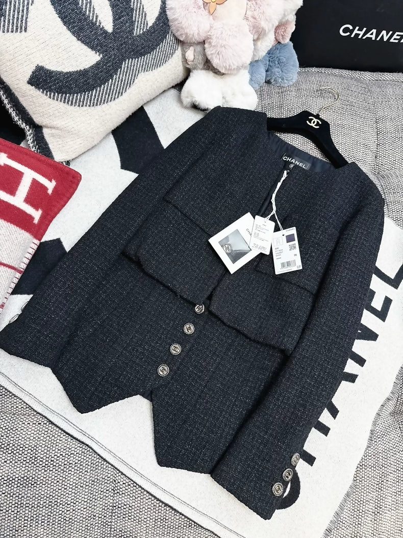 Chanel 22c black tweed jacket,