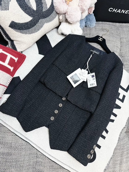 Chanel 22c black tweed jacket,