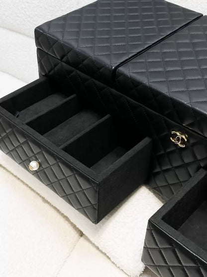 Chanel Métiers d'Art collection, classic black lambskin quilted jewelry case, large size,