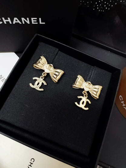 Chanel 22S bow double C earrings