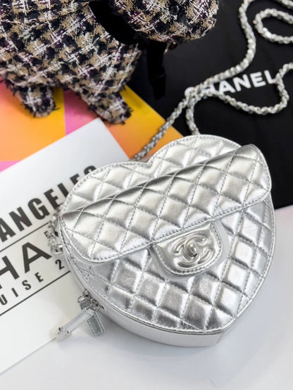 Chanel 25b silver metallicheart-shaped bag