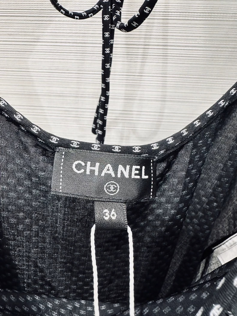 Chanel 24b top with ruffles and double C logo