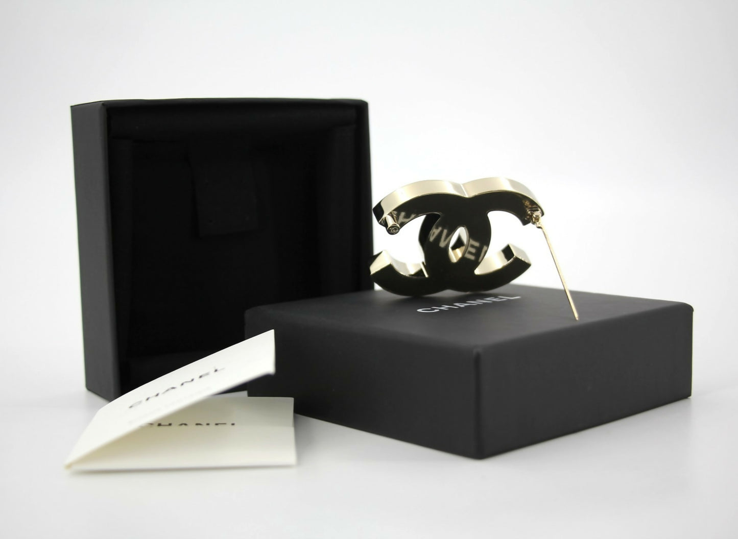Chanel B23C Enamel Black and White Two-Tone CC Brooch