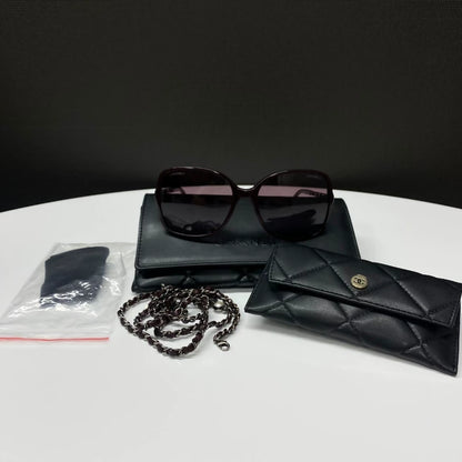 Chanel square-framed enamel rose letter