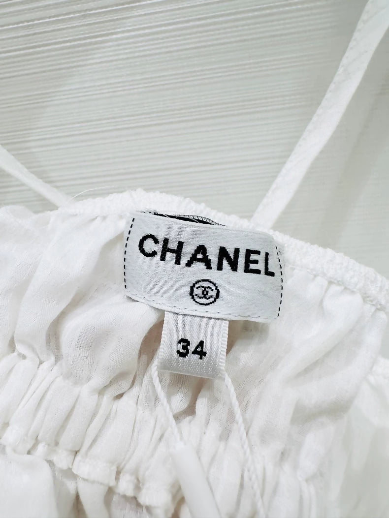 Chanel 25p white top with pearl laces