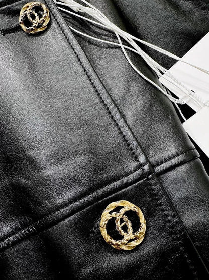 Chanel 2025 black leather vest dress with belt and chain