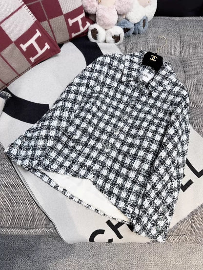 Chanel 23P black, white and blue checkered woven jacket