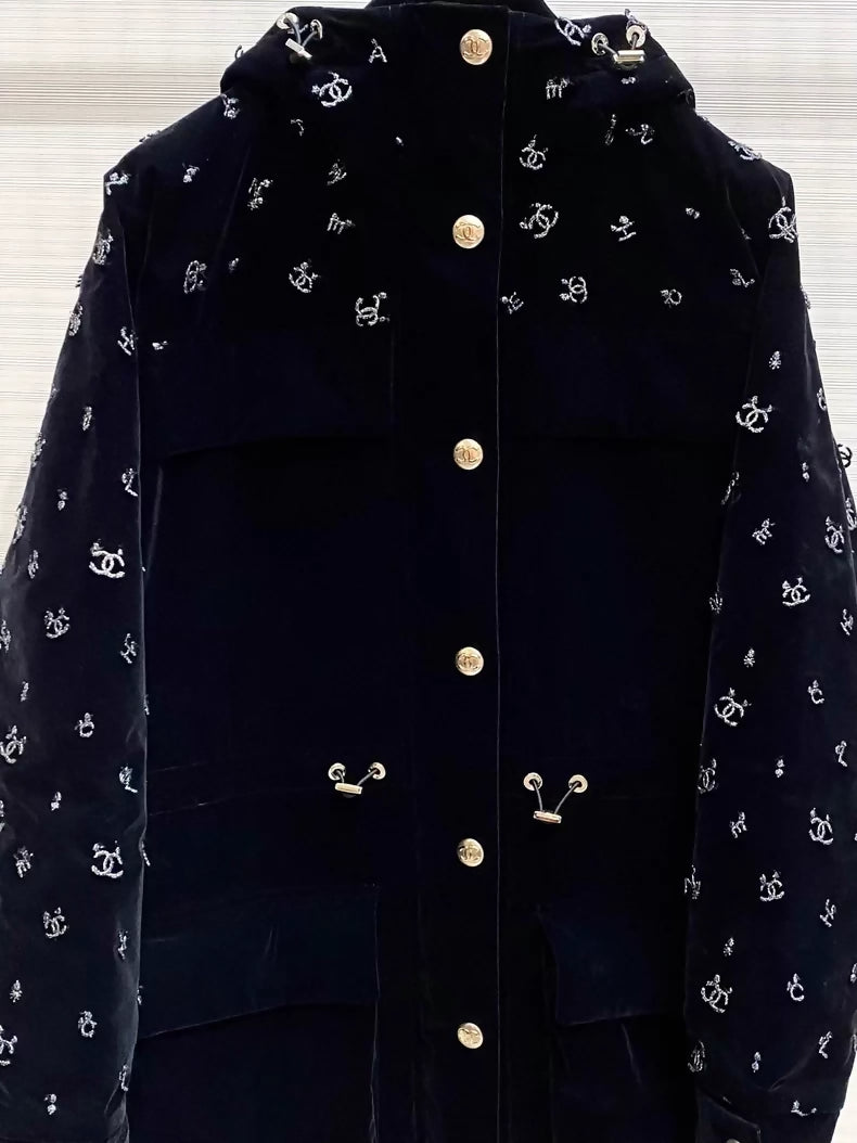 Chanel ski collection, velvet embroidered logo hooded down jacket