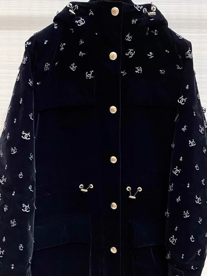 Chanel ski collection, velvet embroidered logo hooded down jacket