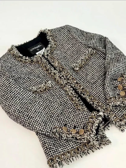 Chanel 10C black and Gold tweed Jacket