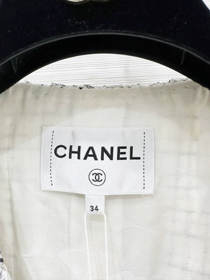 Chanel 24C jacket in black and white checkered tweed