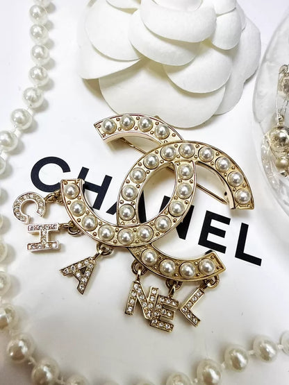 Chanel 20B double C pearl logo brooch