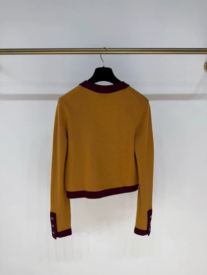 Chanel 21K orange cashmere cardigan