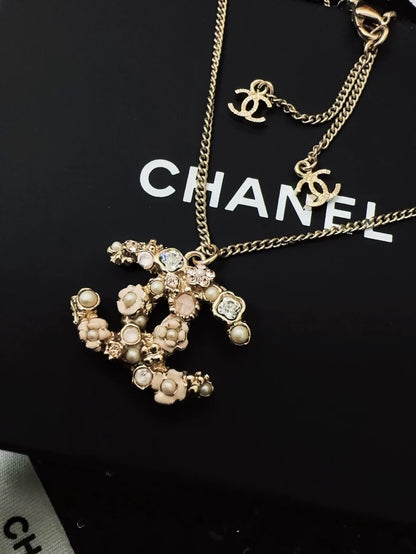Vintage Chanel camellia and pearl necklace