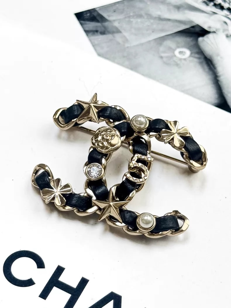 Chanel 20b double C chain pearl and diamond brooch