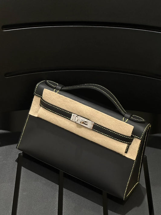 Hermes Kelly Pochette black swift leather with white stitching and yellow inside palladium hardware