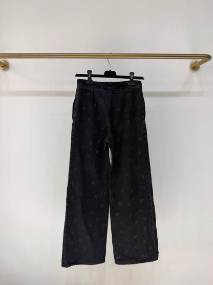 Chanel 23K Black Embossed Camellia Straight Leg Jeans