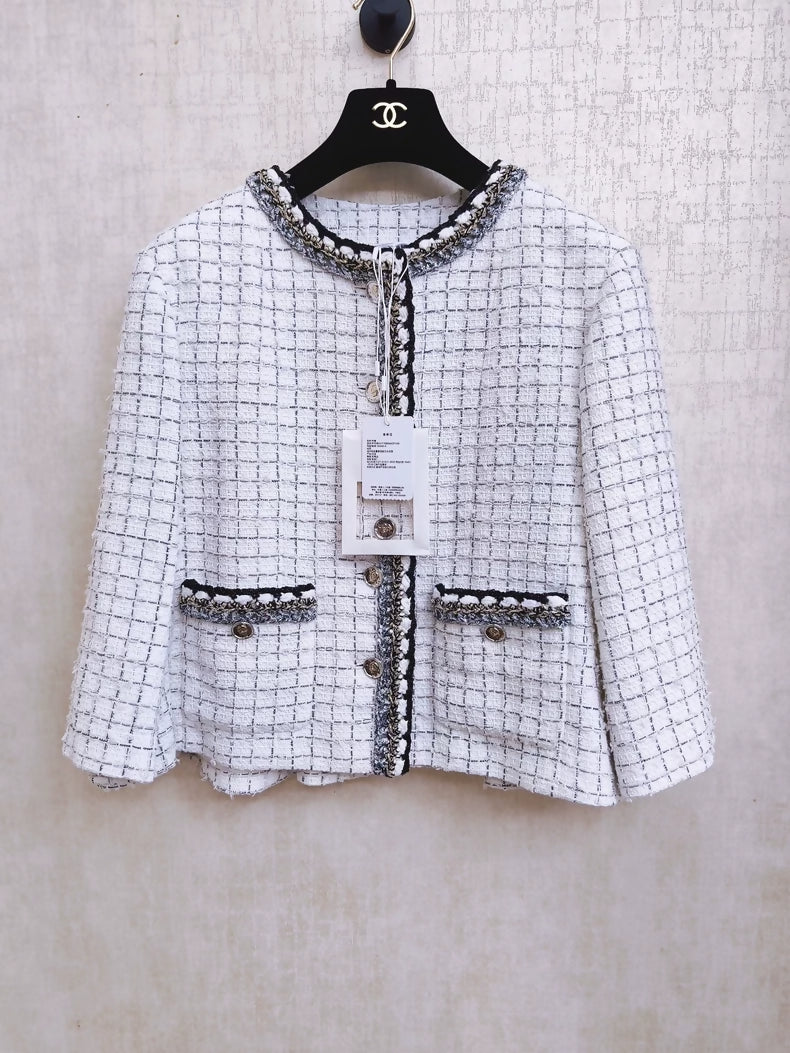 Chanel 25S black and white checkered tweed cape coat