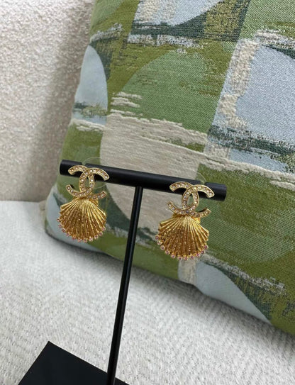 Chanel 23C gold shell earrings