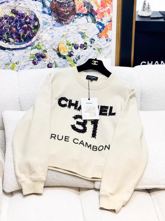 Chanel 20A ecru camellia sweater