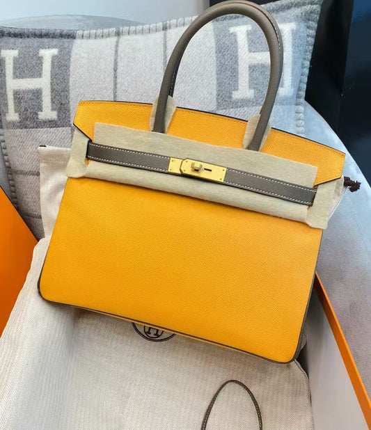 Hermès Birkin handbag in yellow with grey handles and strap, textured leather, gold-tone hardware