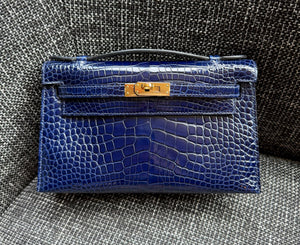 Hermes Kelly Pochette blue sapphire shiny alligator gold hardware