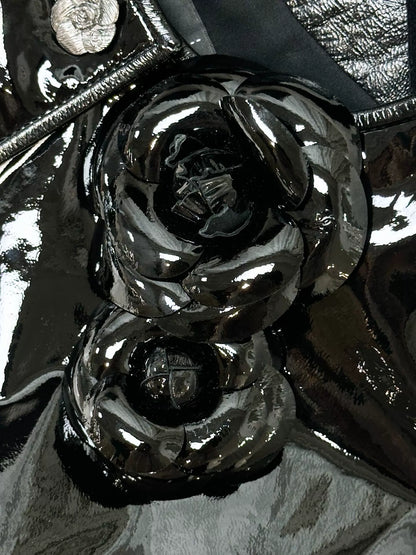 Chanel 23K black leather camellia jacket