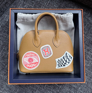Hermes mini bolide imprime caramel Chevre palladium hardware