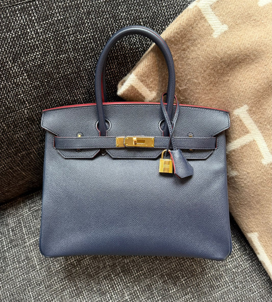 Hermès Birkin handbag in navy blue grained leather with red edge painting and gold-tone hardware