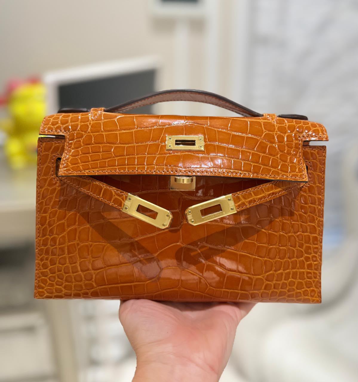 Hermes Kelly pochette Pain d’Epice Shiny Alligator Gold hardware