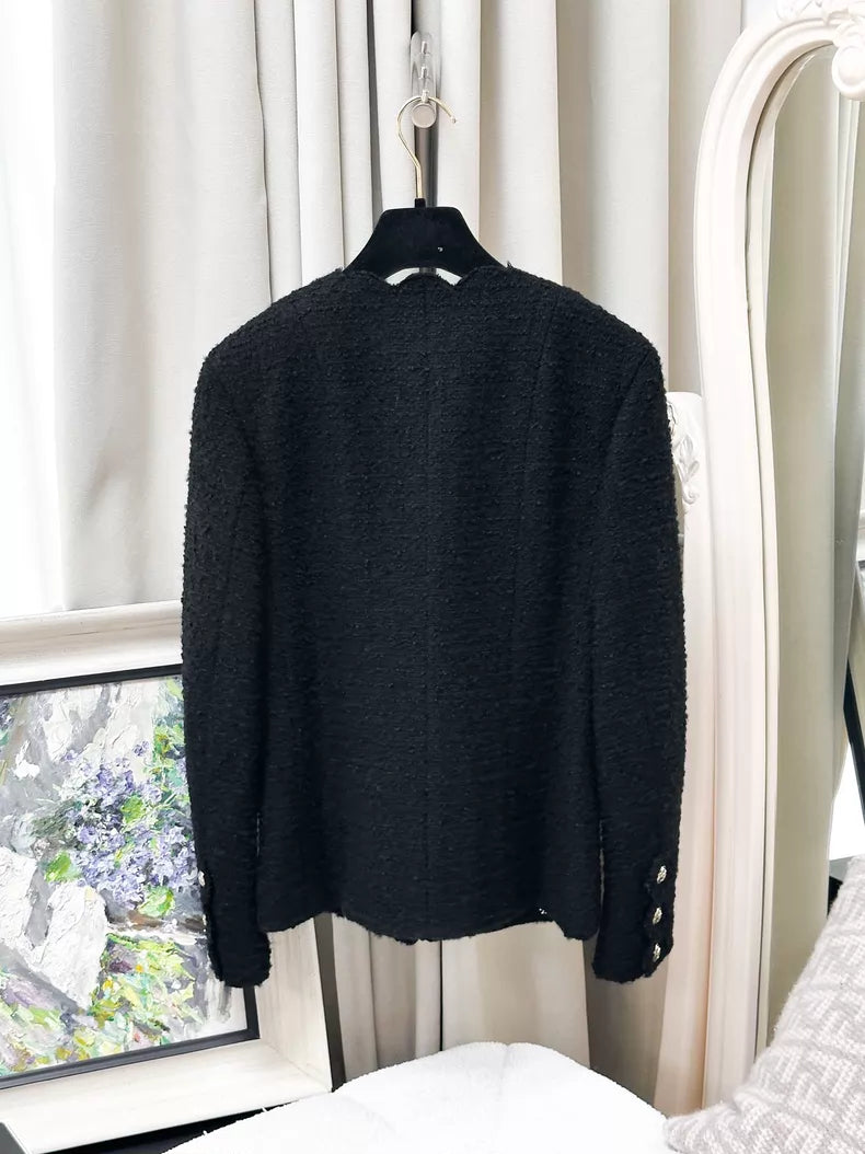 Chanel 20k black tweed jacket