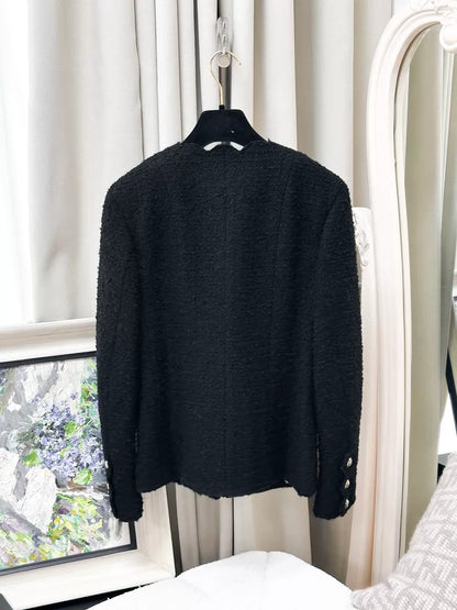 Chanel 20k black tweed jacket