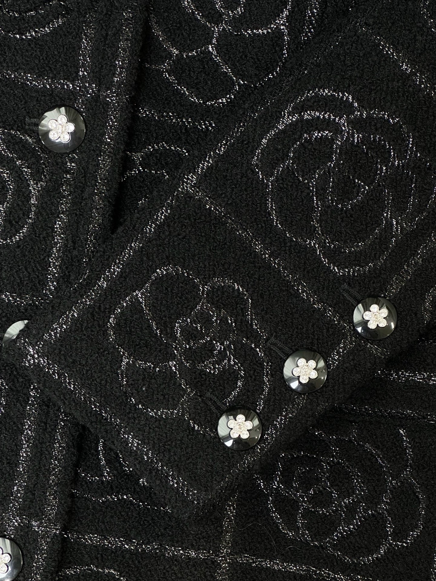 Chanel 23K black camellia coat