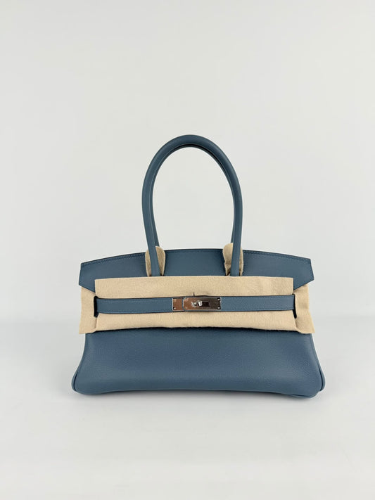 Hermès Birkin handbag in slate blue grained leather with silver-tone hardware and beige felt protector