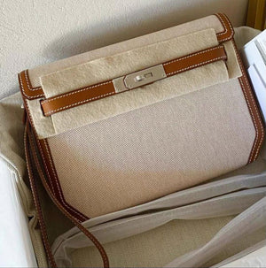 Hermes Kelly Depeches Fauve Barenia & Ecru Toile Palladium hardware