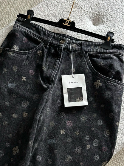 Chanel 25B black all-over graffiti cartoon wide-leg trousers