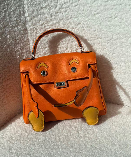 Hermes Kelly dole orange palladium hardware