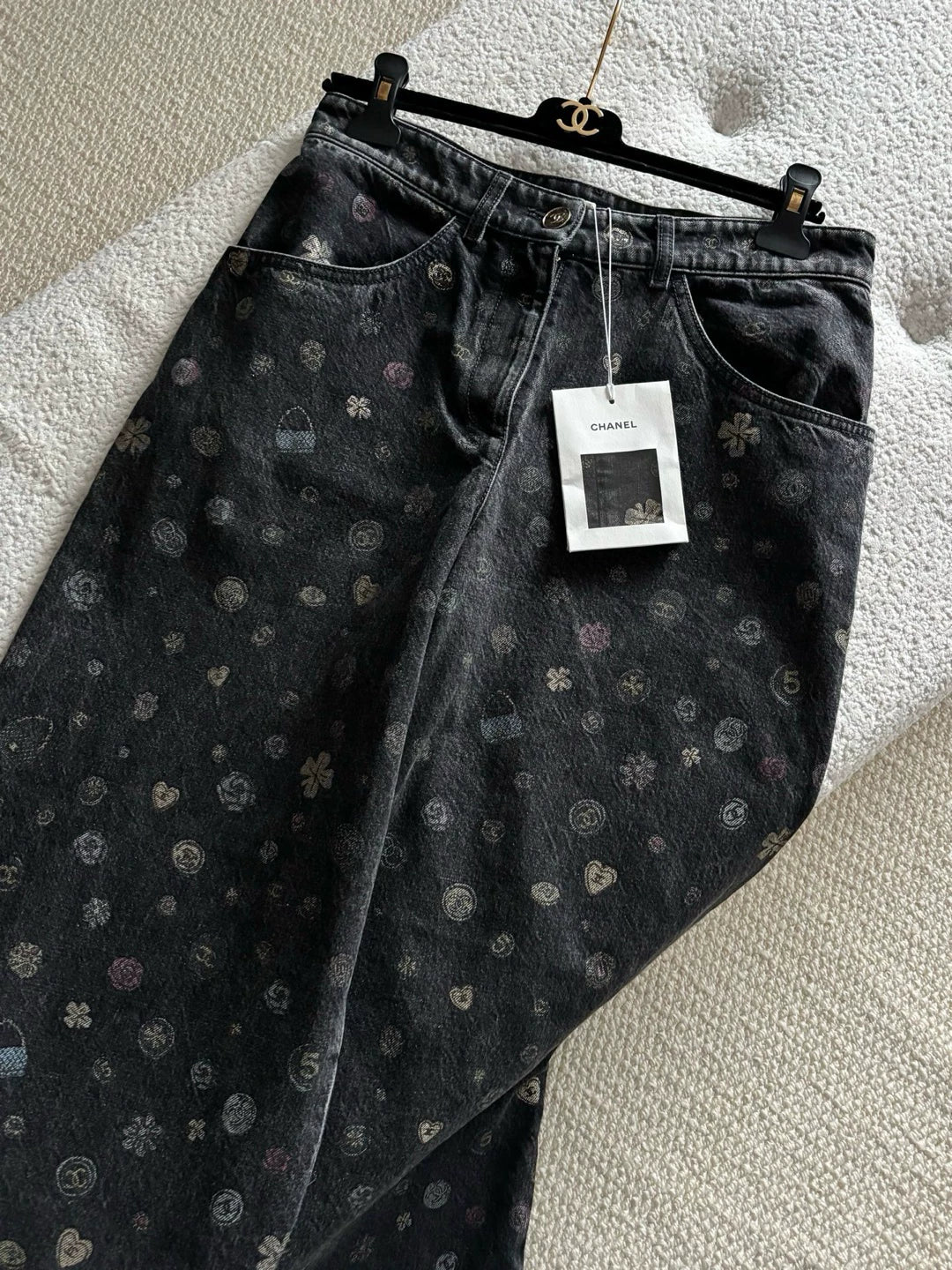Chanel 25B black all-over graffiti cartoon wide-leg trousers