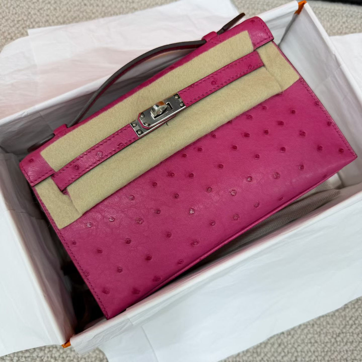 Hermes Kelly pochette Rose Tyrien Ostrich Palladium hardware