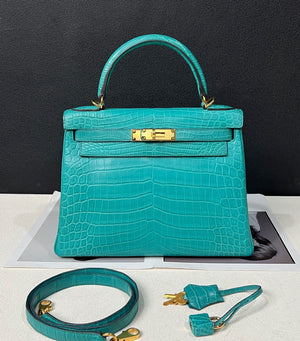 Hermes Kelly 28 blue paon matte alligator gold hardware