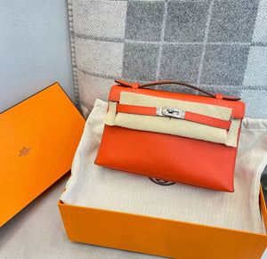 Hermes Kelly pochette orange poppy swift palladium hardware