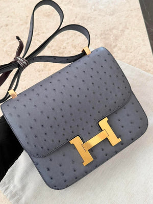 Hermes Constance 24 Verso Gris Agate / Paon Ostrich Gold hardware